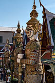 Bangkok Grand Palace, pair of statues of demons (yakshas) gatekeepers of the entrances in the western gallery of the Temple of the Emerald Buddha (Wat Phra Kaew). 